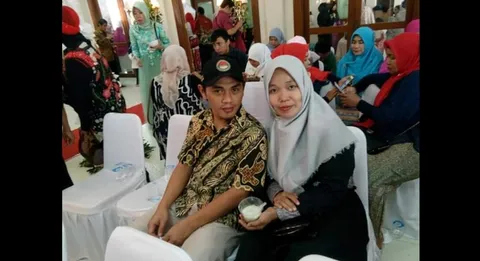 Foto sampul undangan Siti Aisyah & Aminudin