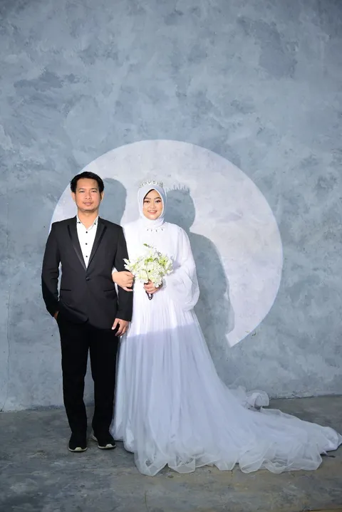 Foto sampul undangan Tiwi & Arul